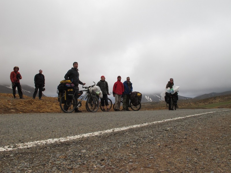 Morocco, High Atlas. Bicycle group on top of the pass