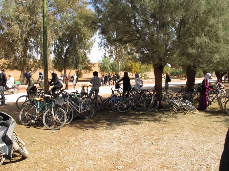 Morocco, Boumalne Dades. Pupils on the bicycles