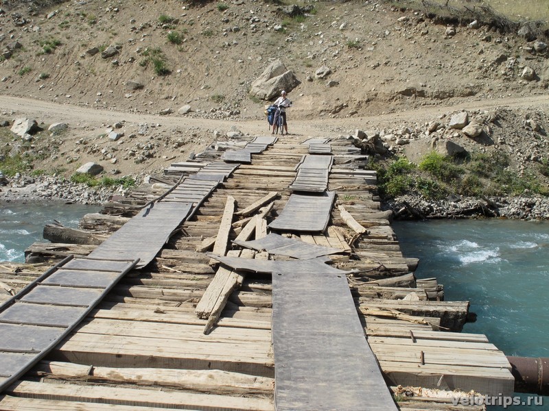 Tajikistan, Rufigar. Mountain river bridge