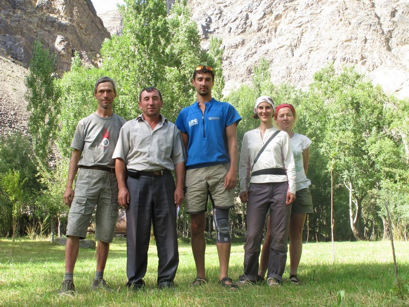 Tajikistan, Rost pass. Five people in garden