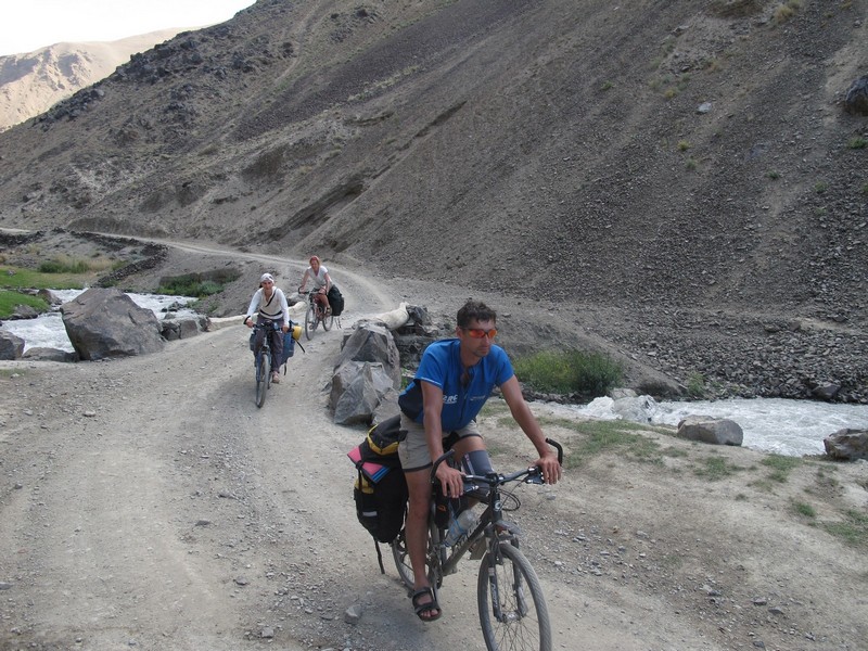 Tajikistan, Rost pass. Bicycles on road