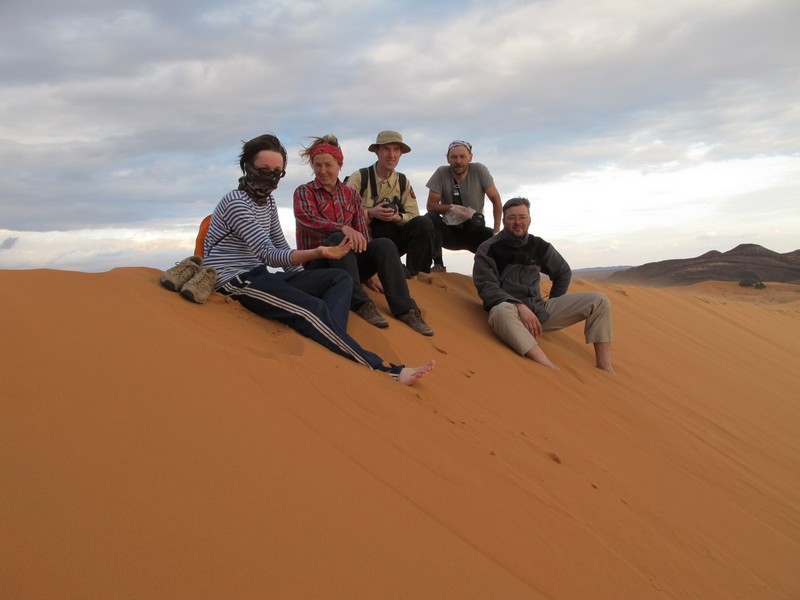 Morocco, Merzouga. Group on the dune