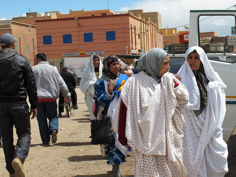 Morocco, White dressing berber women.